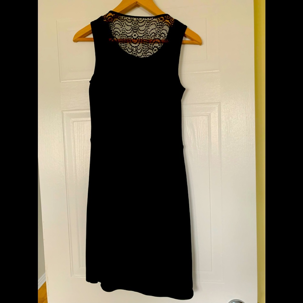 BCBG black mini dress. Back is lace.